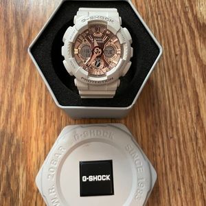 Women’s G-Shock. Rose gold face. White band